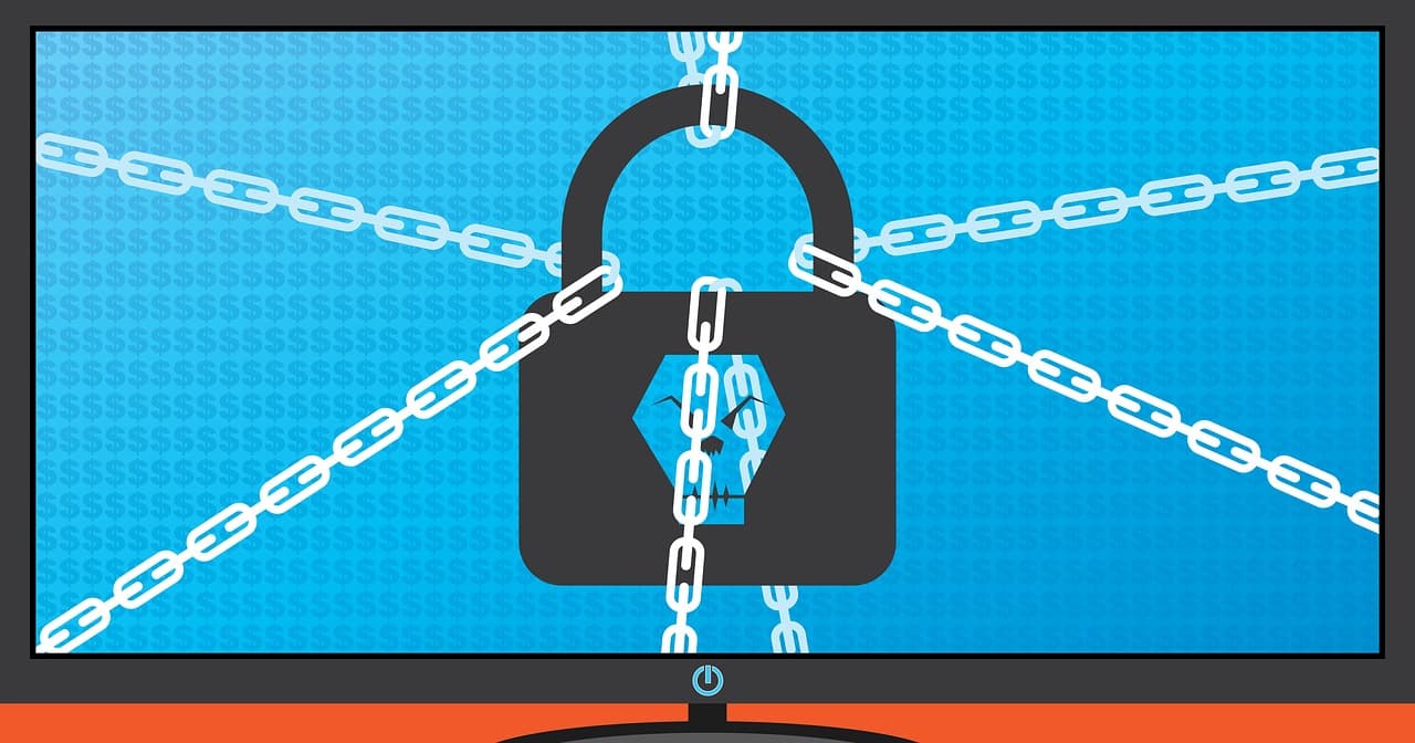 Écran affichant du code lié à une attaque par ransomware, symbolisant le risque de cyberattaque en PME